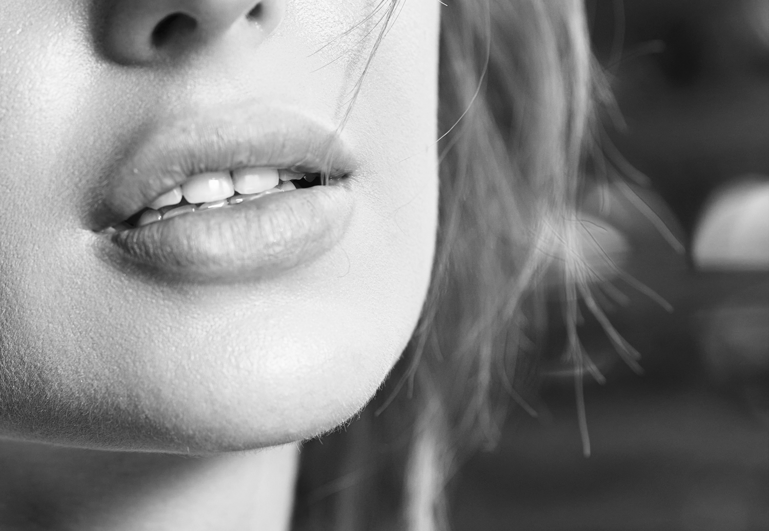 woman with big lips black and white photo