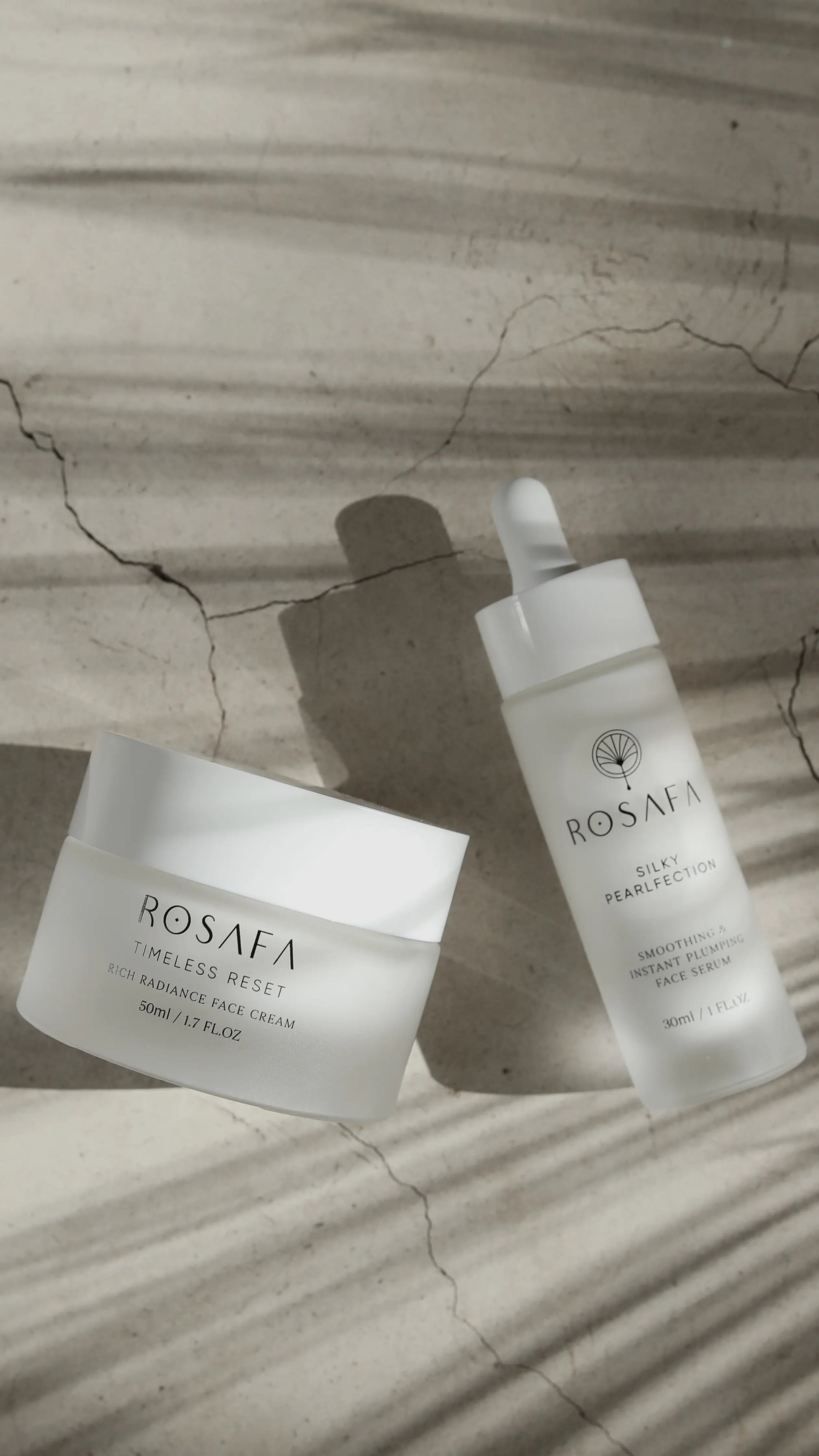 rosafa skincare products on palm tree shadow background