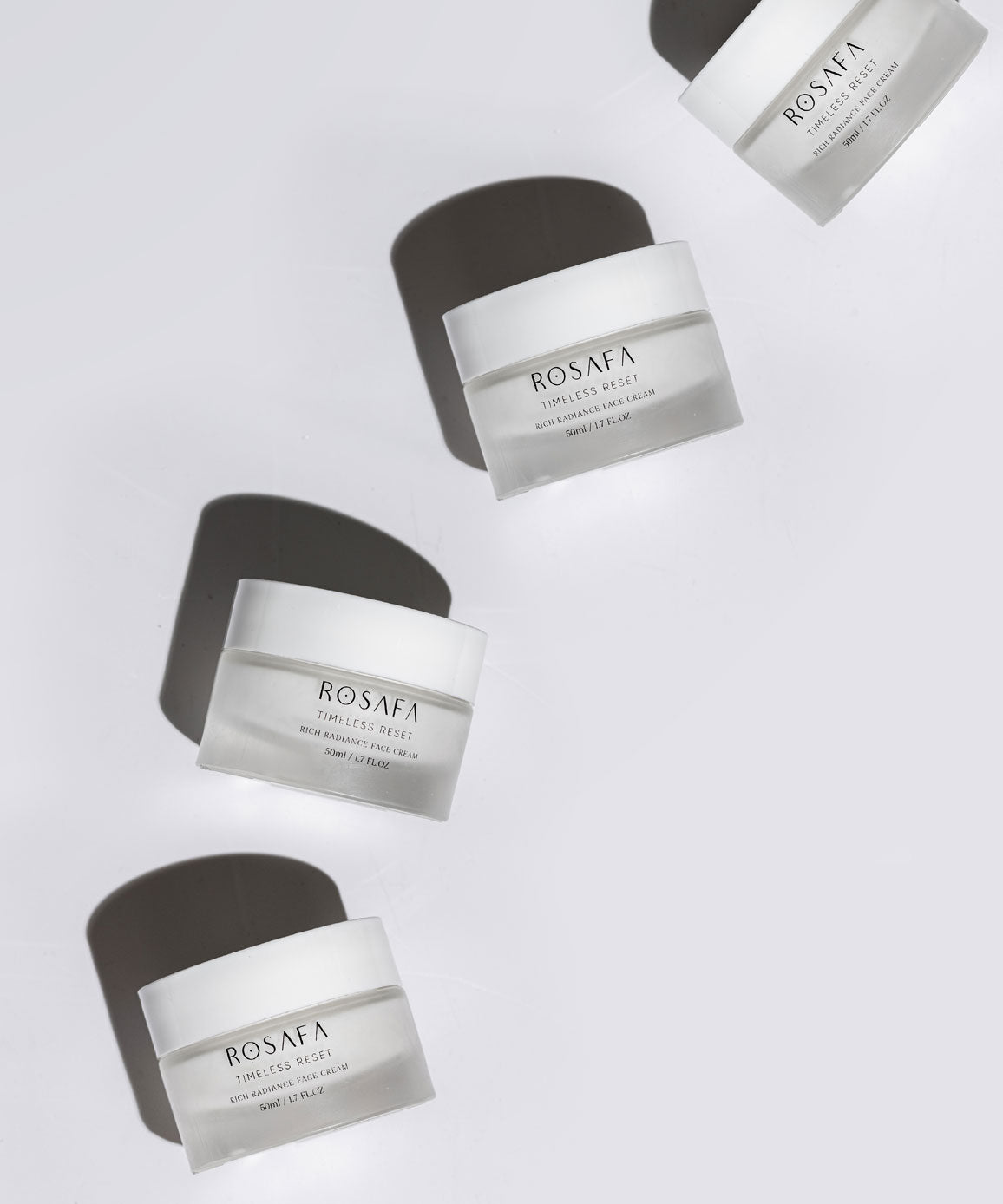 four rosafa timeless reset face creams on the white background